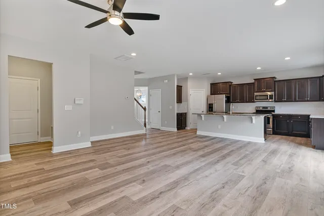 a view of a kitchen with a dishwasher and a window