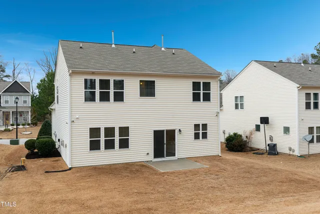 a room with a bed and a window