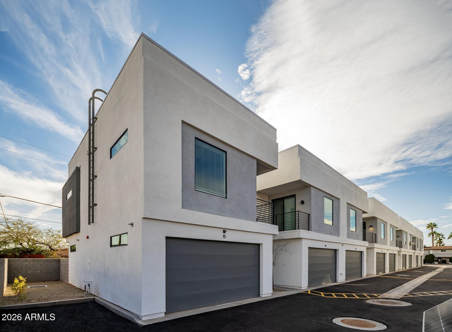 1349 West Osborn Road, Unit 6 Phoenix, AZ 85013 - Photo 25 of 37 a view of multiple house with a street
