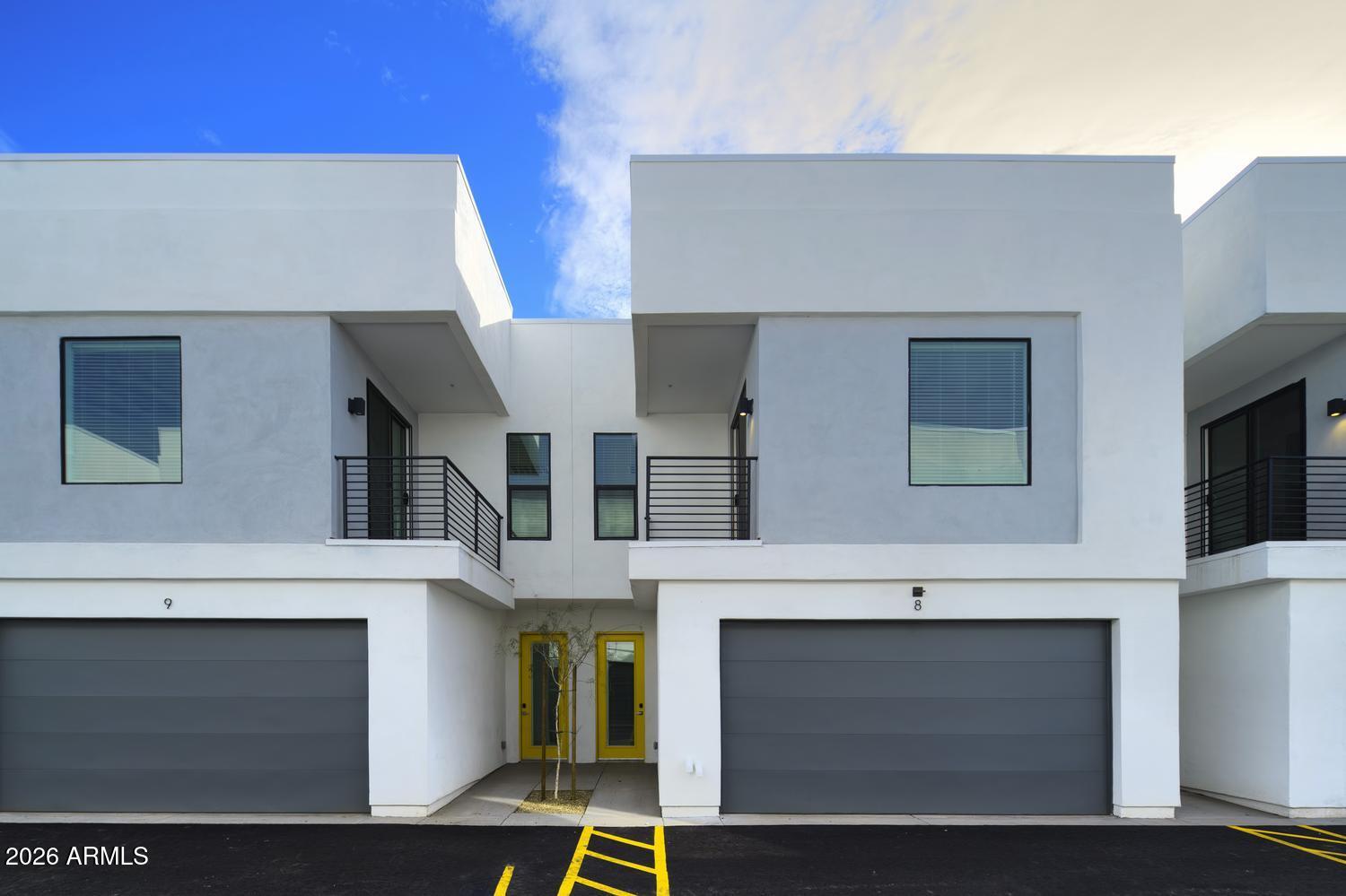 1349 West Osborn Road, Unit 6 Phoenix, AZ 85013 - Photo 27 of 37 a building with a window and balcony
