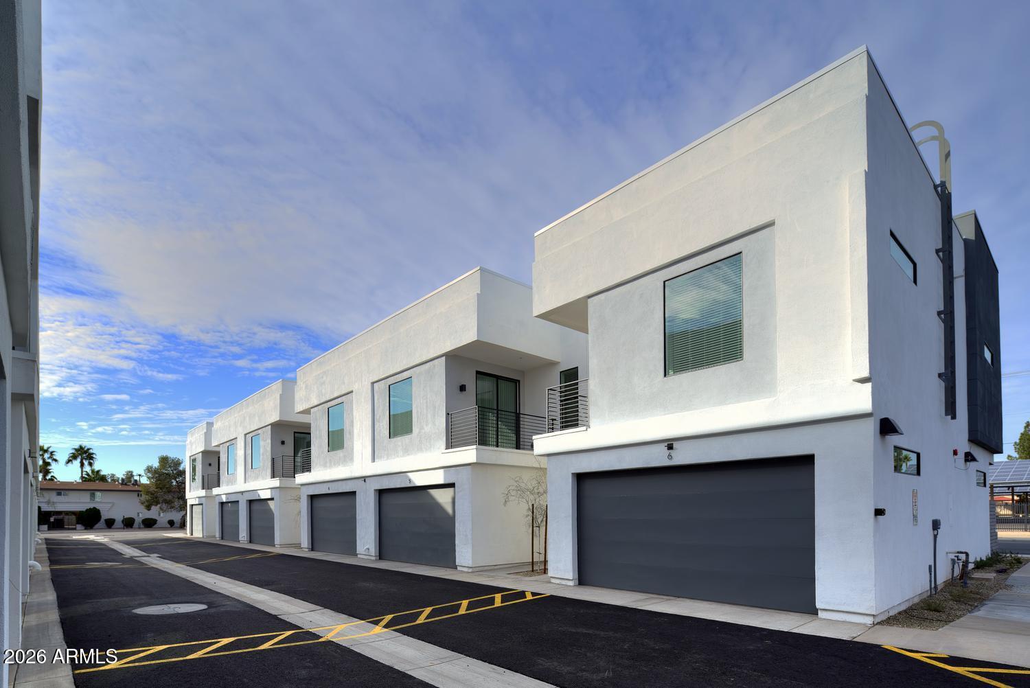 1349 West Osborn Road, Unit 6 Phoenix, AZ 85013 - Photo 29 of 37 a view of street with big house