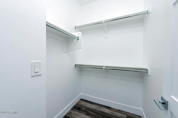 a view of an empty walk in closet