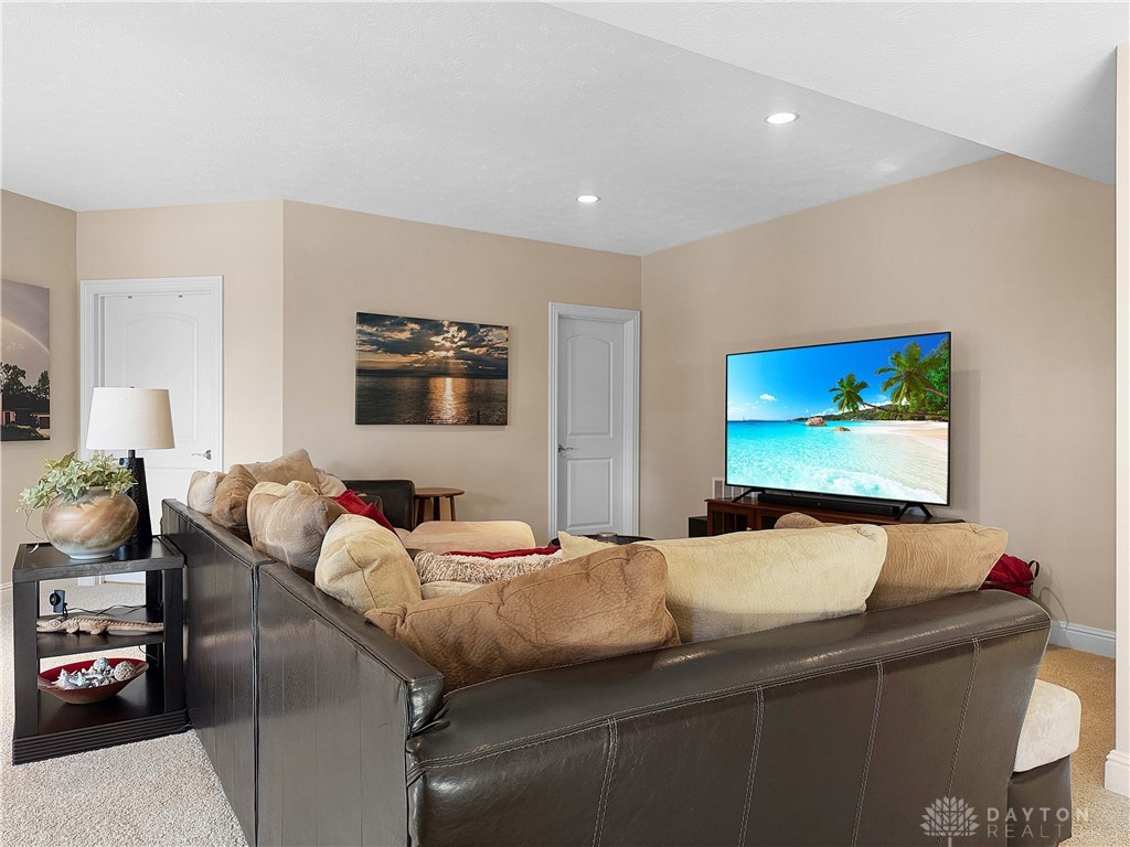 4096 Middle Urbana Road Urbana, OH 43078 - Photo 35 of 96 This inviting living area features plush seating and ample lighting, creating a comfortable gathering space.