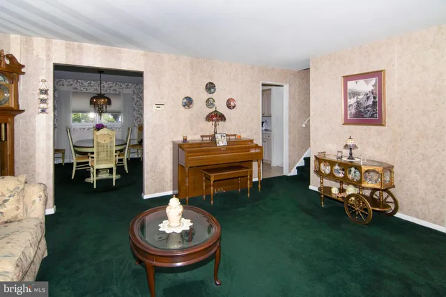 a room with furniture and a fireplace