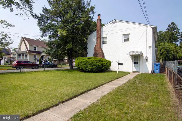 a house view with a backyard space
