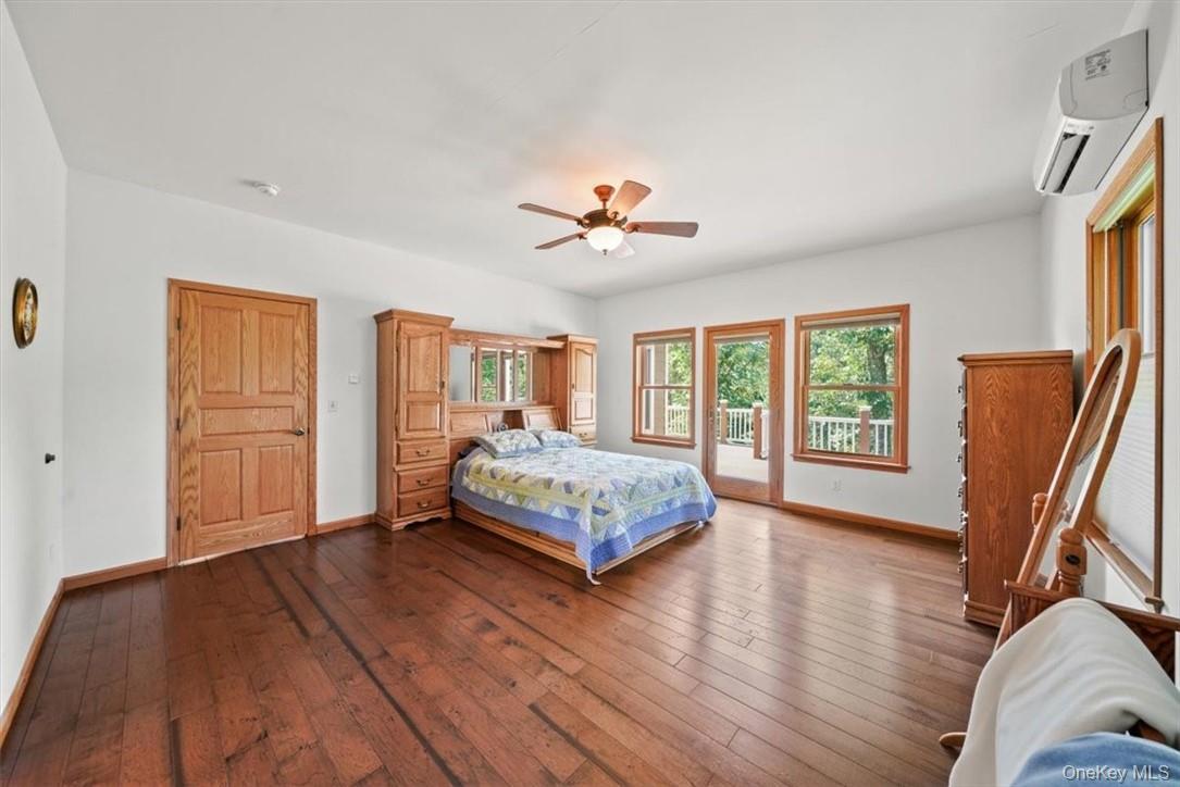 1038 Milanville Road Beach Lake, PA 18405 - Photo 14 of 36 a living room with furniture and a large window