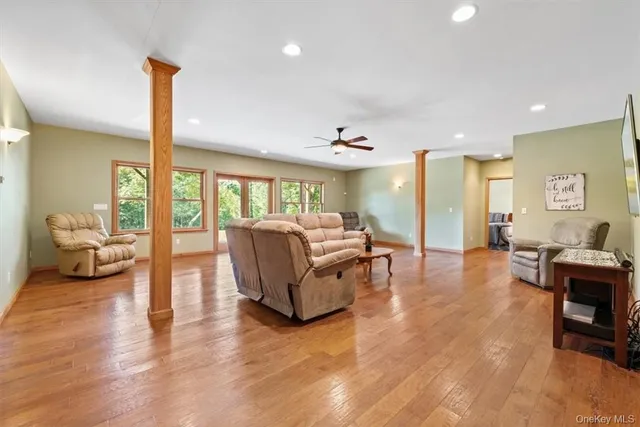 a living room with furniture window and a table