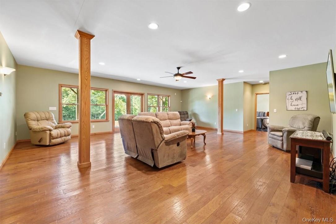 1038 Milanville Road Beach Lake, PA 18405 - Photo 17 of 36 a living room with furniture window and a table