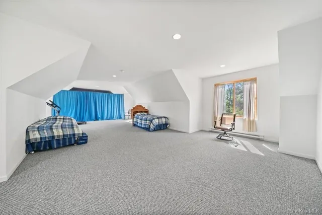 a room with a bed and a window