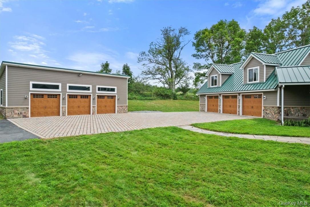 1038 Milanville Road Beach Lake, PA 18405 - Photo 4 of 36 a view of a house with a yard and potted plants