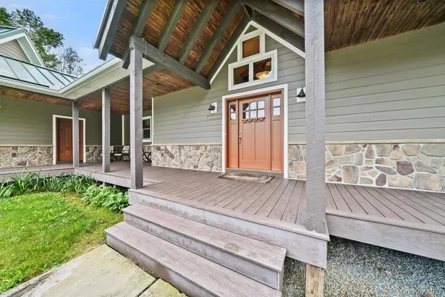 a view of a livingroom with wooden floor