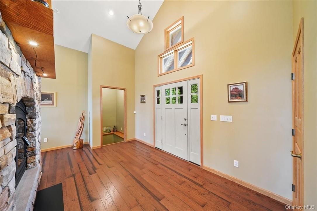 1038 Milanville Road Beach Lake, PA 18405 - Photo 6 of 36 a view of a livingroom with wooden floor