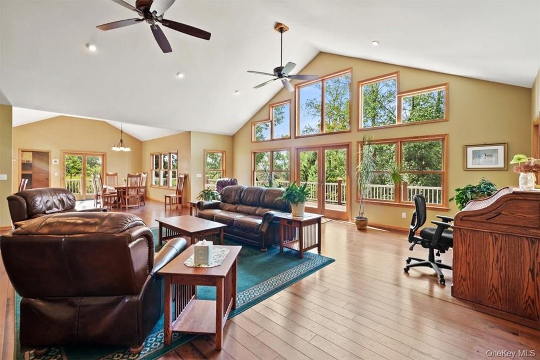 1038 Milanville Road Beach Lake, PA 18405 - Photo 9 of 36 a living room with furniture and a window