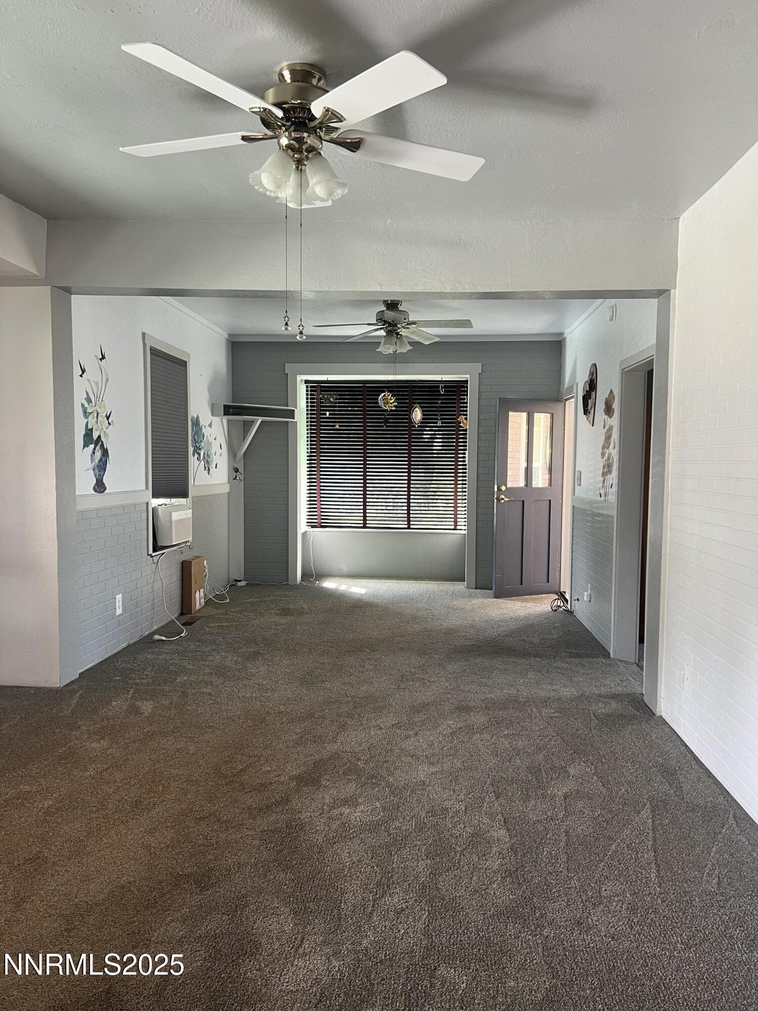 16 Tucker Lane Yerington, NV 89447 - Photo 3 of 12 a view of livingroom and window