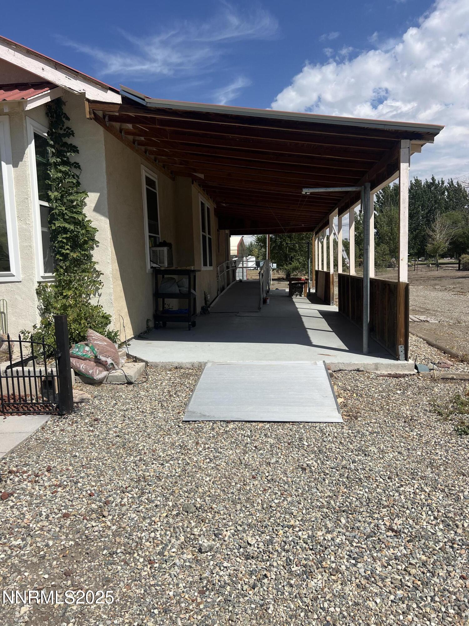 16 Tucker Lane Yerington, NV 89447 - Photo 10 of 12 a view of a porch