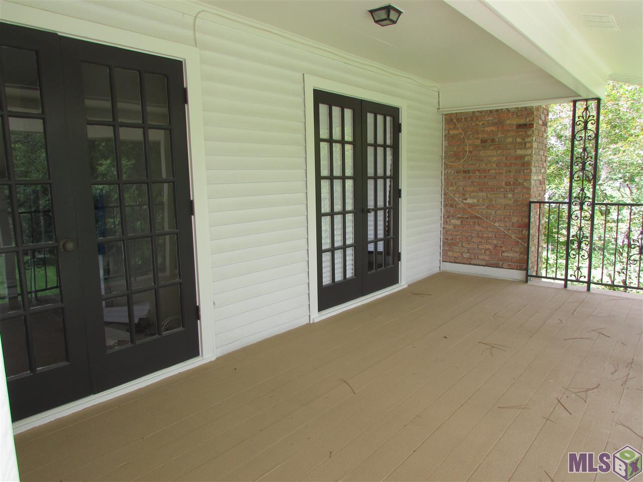 845 Diron Circle Baton Rouge, LA 70810 - Photo 15 of 17 Upstairs Bedrooms Balcony Doors
