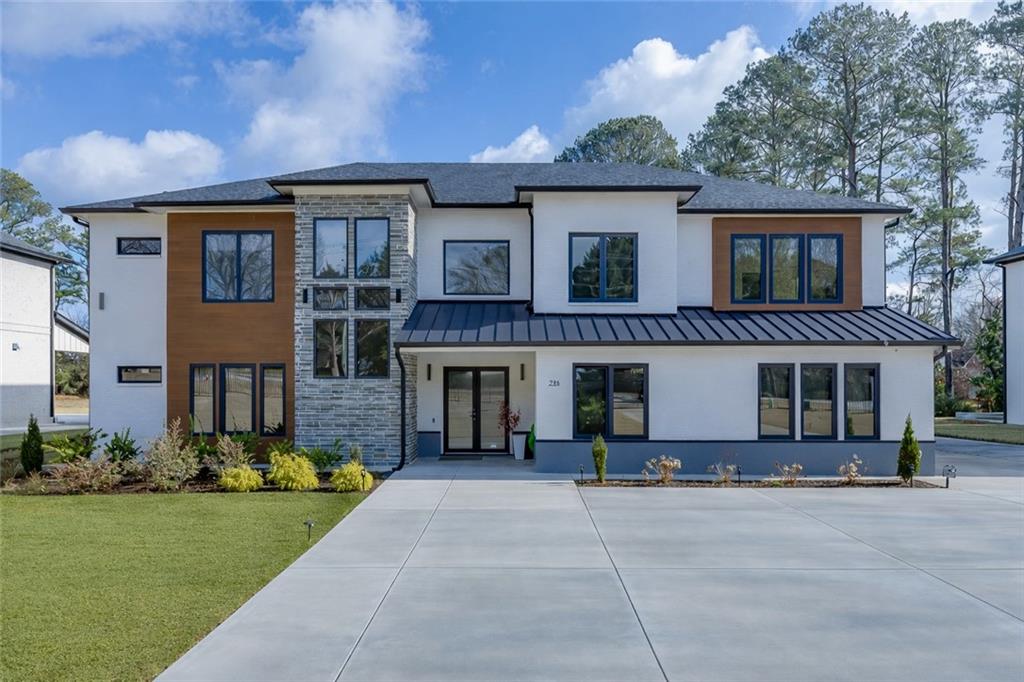 741 Rock Springs Road, Unit 3 Lawrenceville, GA 30043 - Photo 1 of 53 a view of a yard in front of a house
