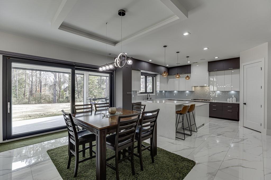 741 Rock Springs Road, Unit 3 Lawrenceville, GA 30043 - Photo 14 of 53 a view of a dining room and livingroom with furniture window
