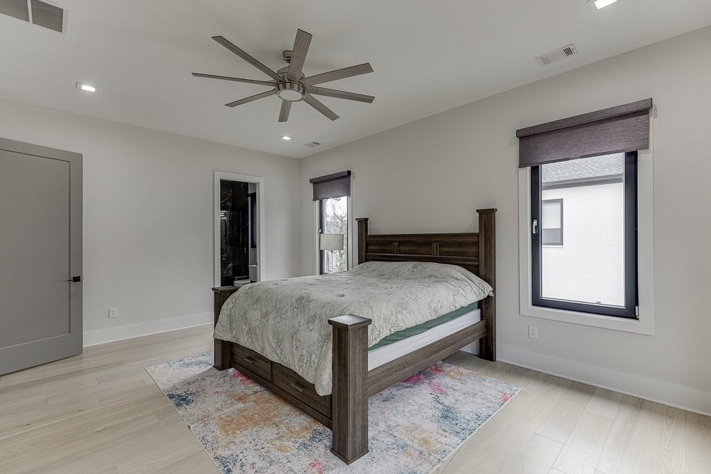 741 Rock Springs Road, Unit 3 Lawrenceville, GA 30043 - Photo 29 of 53 a bedroom with a large bed and a window