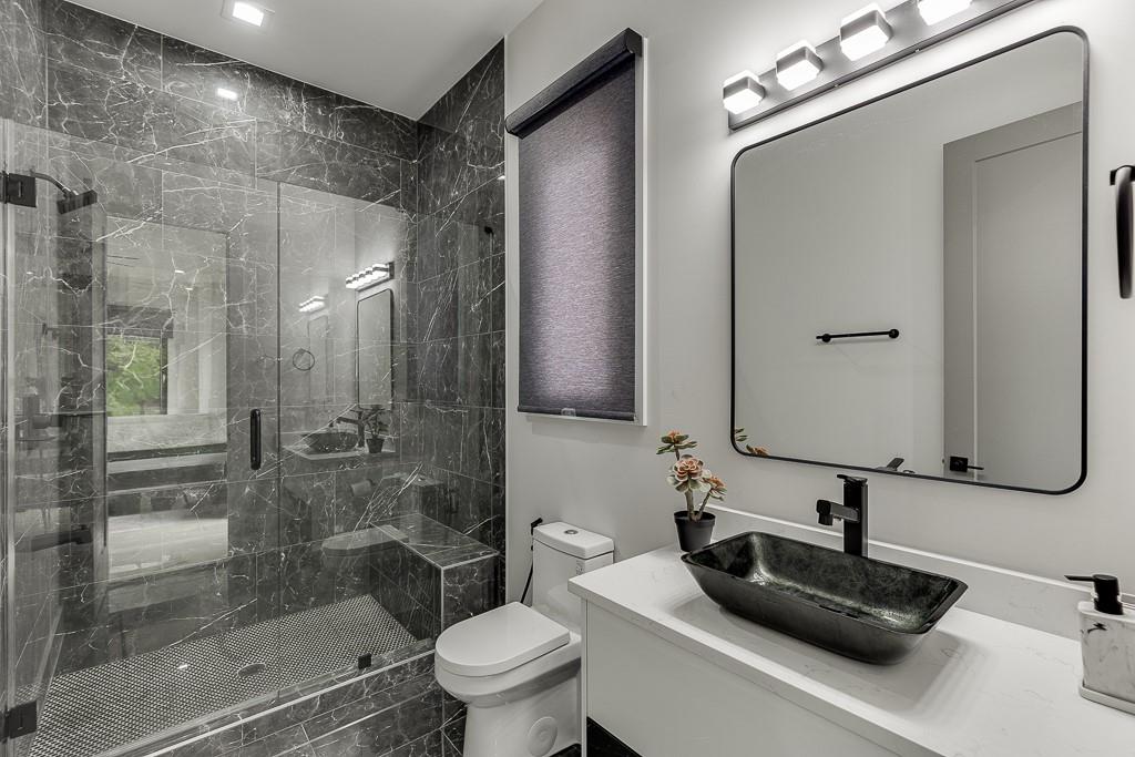 741 Rock Springs Road, Unit 3 Lawrenceville, GA 30043 - Photo 30 of 53 a bathroom with a sink a toilet and shower