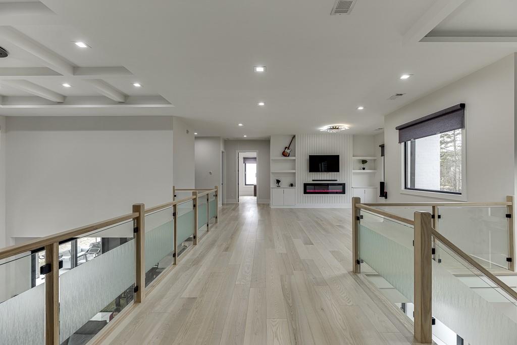 741 Rock Springs Road, Unit 3 Lawrenceville, GA 30043 - Photo 35 of 53 a view of a kitchen with cabinets and wooden floor