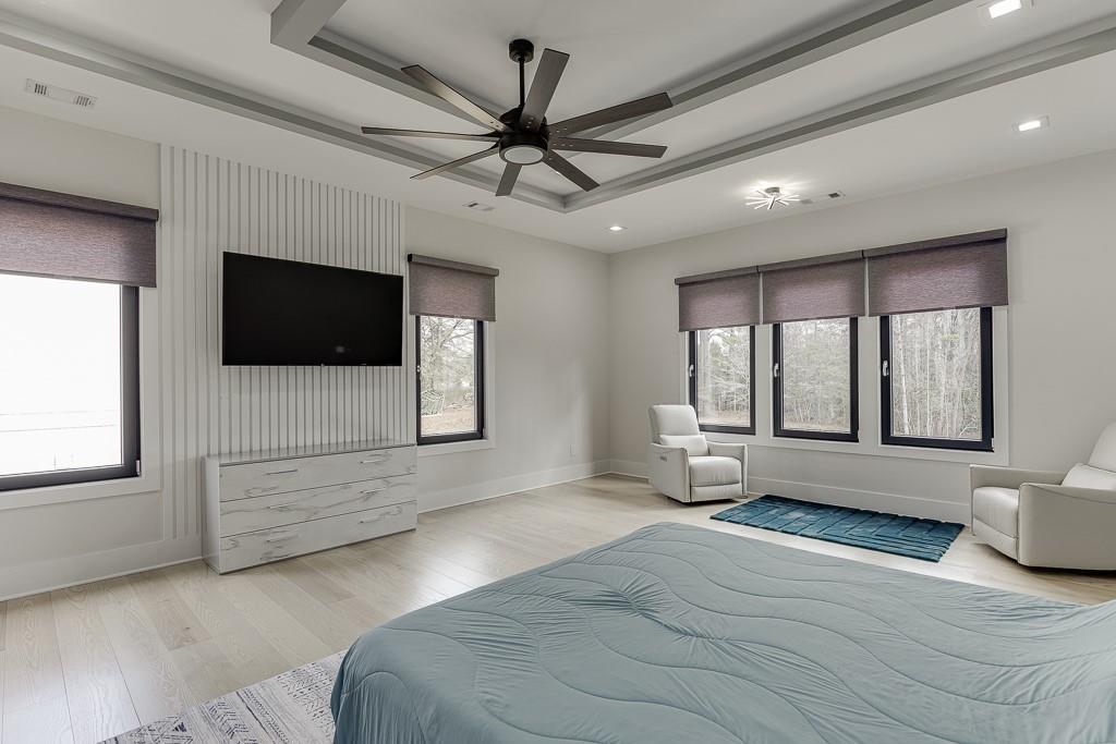 741 Rock Springs Road, Unit 3 Lawrenceville, GA 30043 - Photo 36 of 53 a view of an empty room with a window and a flat screen tv