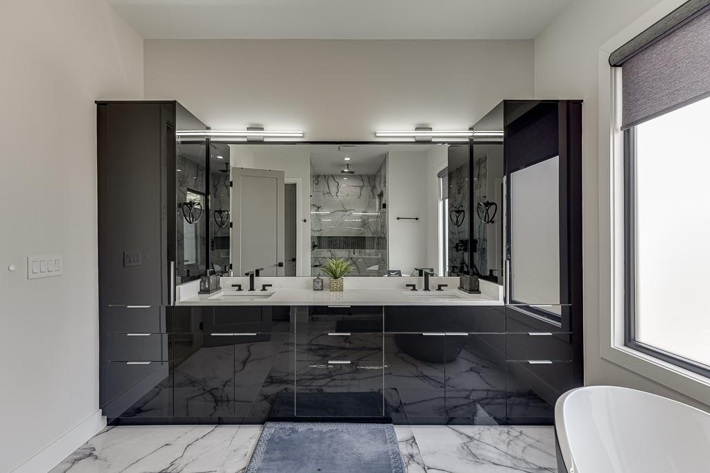 741 Rock Springs Road, Unit 3 Lawrenceville, GA 30043 - Photo 41 of 53 a bathroom with a double vanity sink toilet and shower
