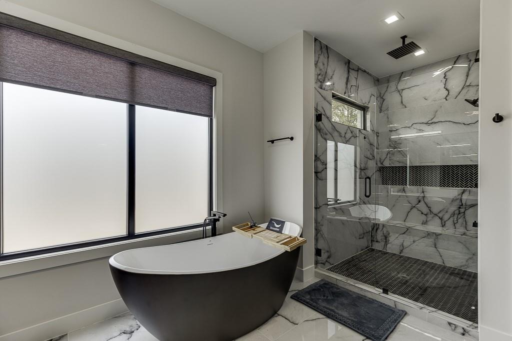 741 Rock Springs Road, Unit 3 Lawrenceville, GA 30043 - Photo 42 of 53 a bathroom with a bathtub and shower