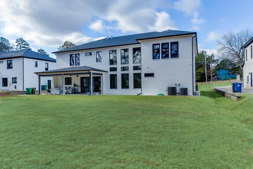 741 Rock Springs Road, Unit 3 Lawrenceville, GA 30043 - Photo 45 of 53 a view of a house with a yard and sitting area