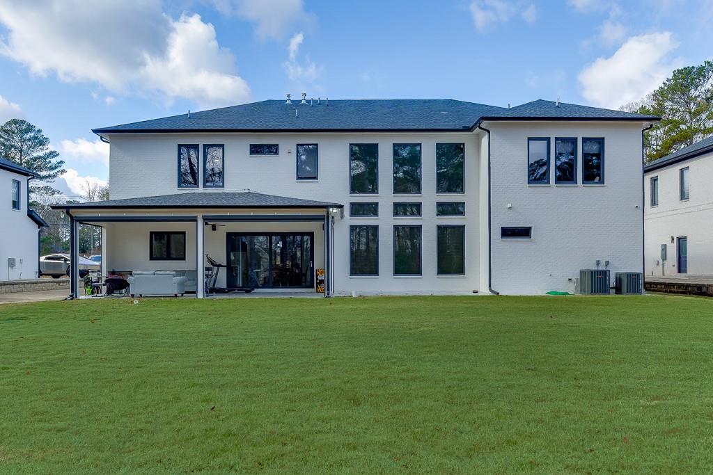 741 Rock Springs Road, Unit 3 Lawrenceville, GA 30043 - Photo 46 of 53 a view of an house with backyard space and balcony