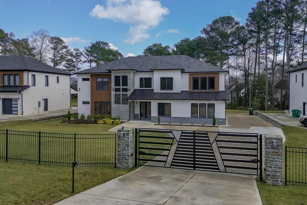 741 Rock Springs Road, Unit 3 Lawrenceville, GA 30043 - Photo 50 of 53 a front view of a house with a garden