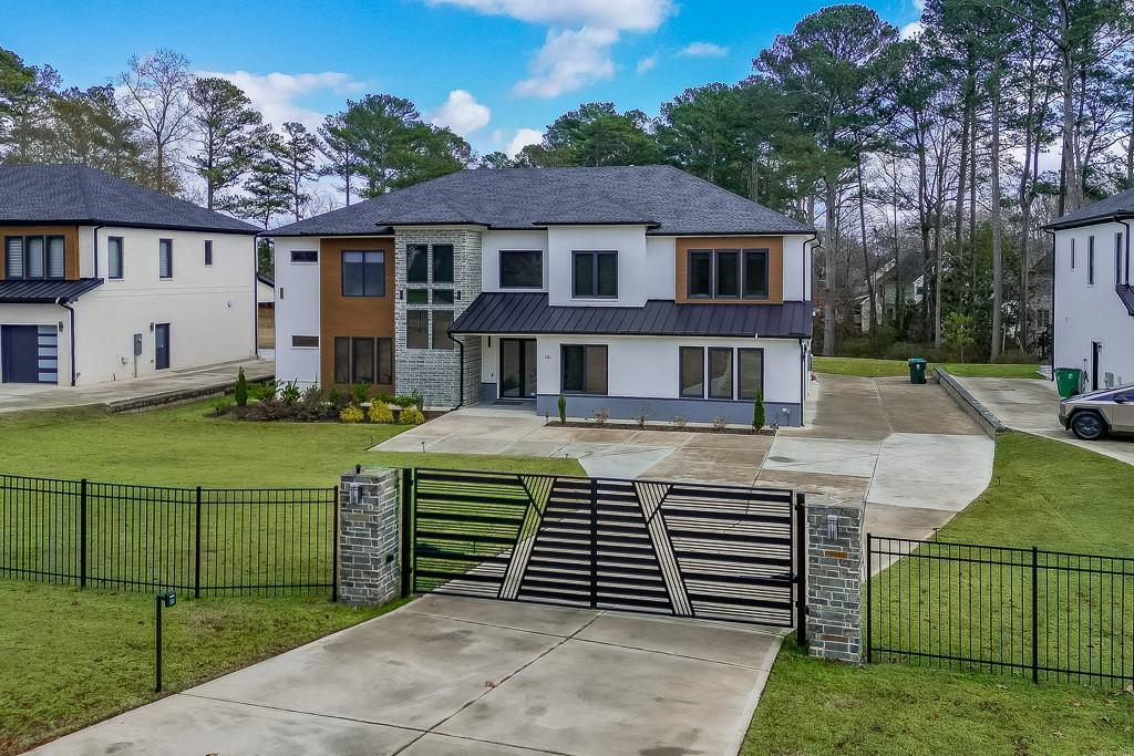 741 Rock Springs Road, Unit 3 Lawrenceville, GA 30043 - Photo 51 of 53 a front view of a house with a garden
