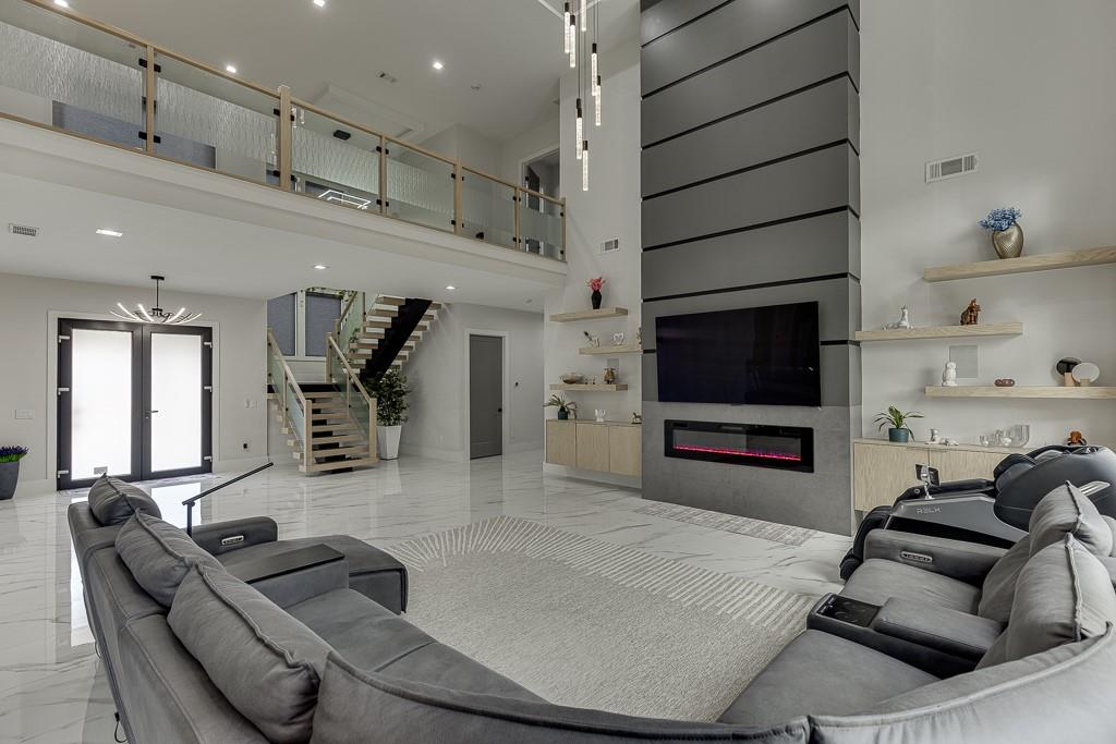741 Rock Springs Road, Unit 3 Lawrenceville, GA 30043 - Photo 8 of 53 a living room with furniture and a flat screen tv