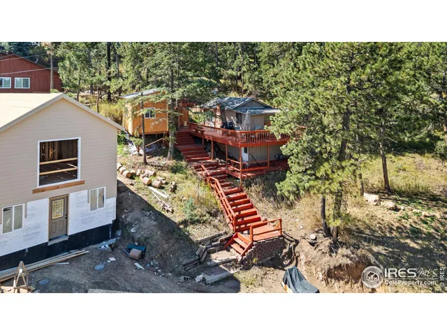 a balcony with a stove and a couch