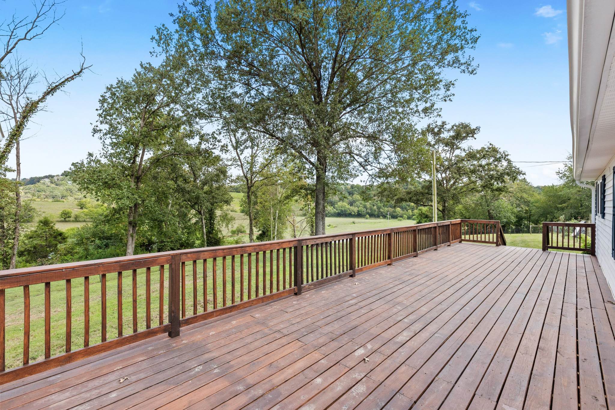 2490 Clampit Hollow Road Lafayette, TN 37083 - Photo 11 of 55 a view of balcony with wooden floor and fence