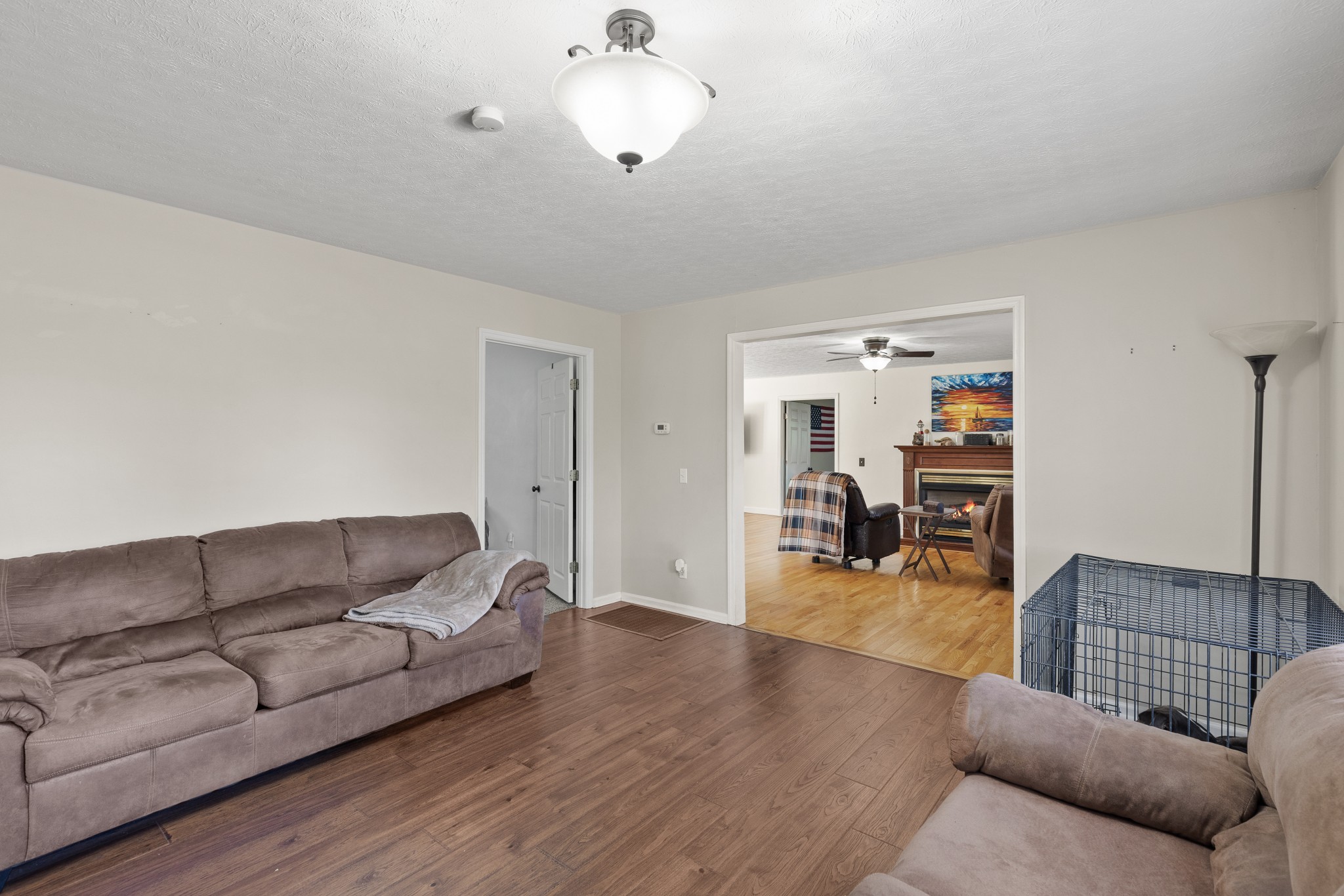 2490 Clampit Hollow Road Lafayette, TN 37083 - Photo 13 of 55 a living room with furniture and wooden floor