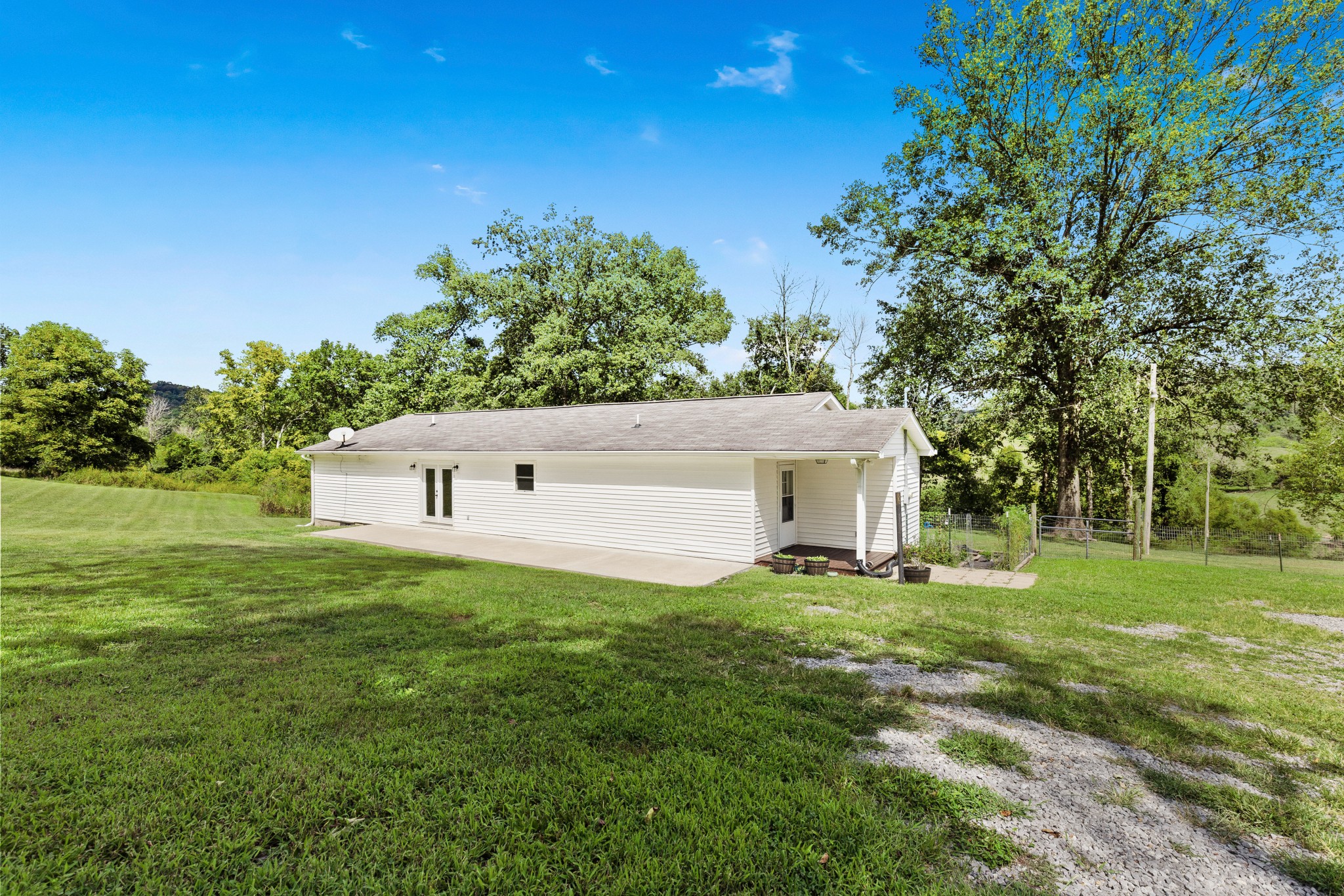 2490 Clampit Hollow Road Lafayette, TN 37083 - Photo 35 of 55 a front view of a house with a yard