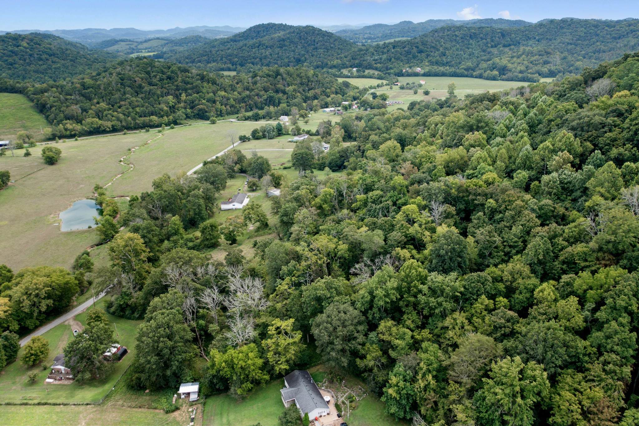 2490 Clampit Hollow Road Lafayette, TN 37083 - Photo 8 of 55 an aerial view of a houses with a yard