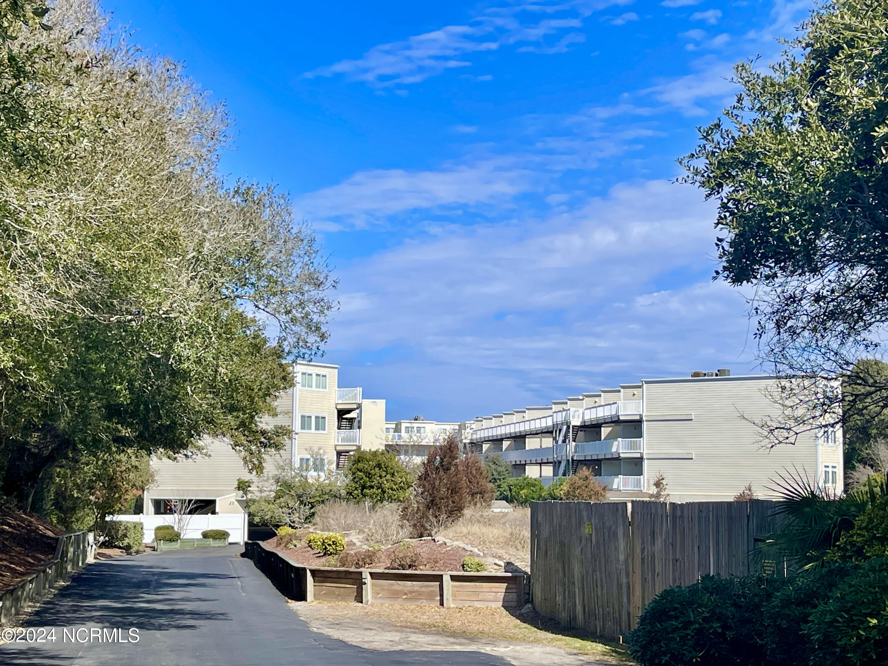 650 Salter Path Road, Unit 308 Pine Knoll Shores, NC 28512 - Photo 38 of 41 View from Street Entrance