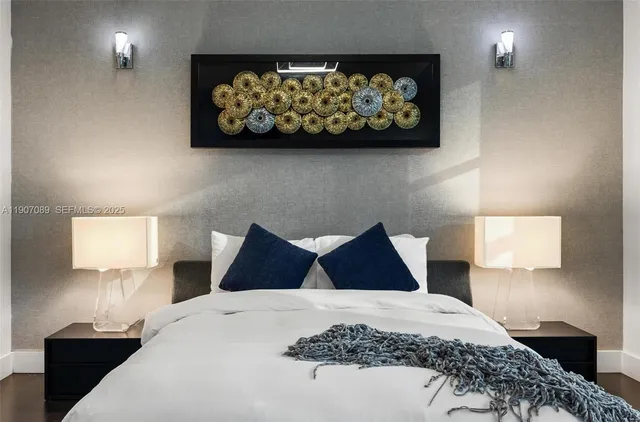 a work place with furniture and a flat screen tv