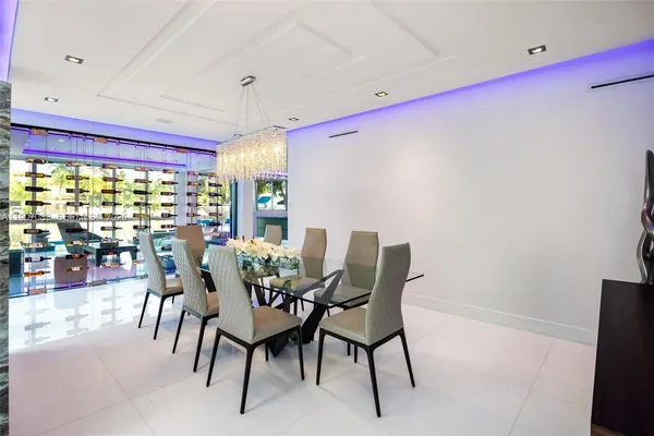 a kitchen with a stove and a white refrigerator