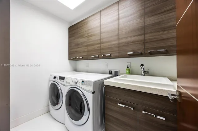 a bathroom with a double vanity sink toilet mirror and shower