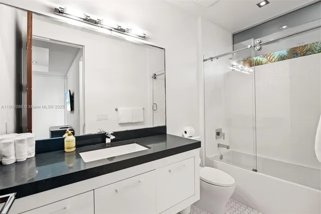 a view of a lake with a house in the background