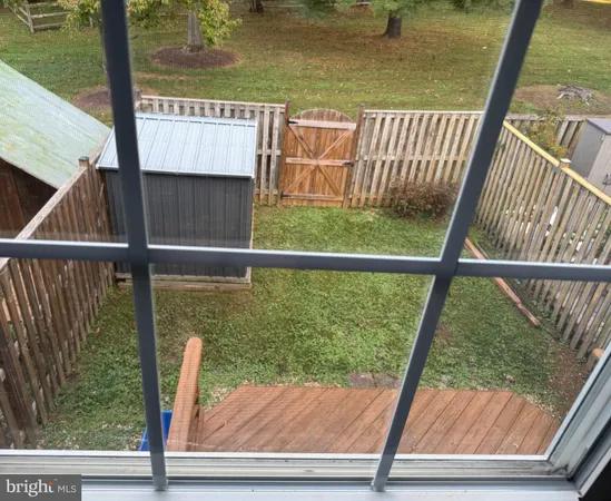 a view of balcony with wooden floor