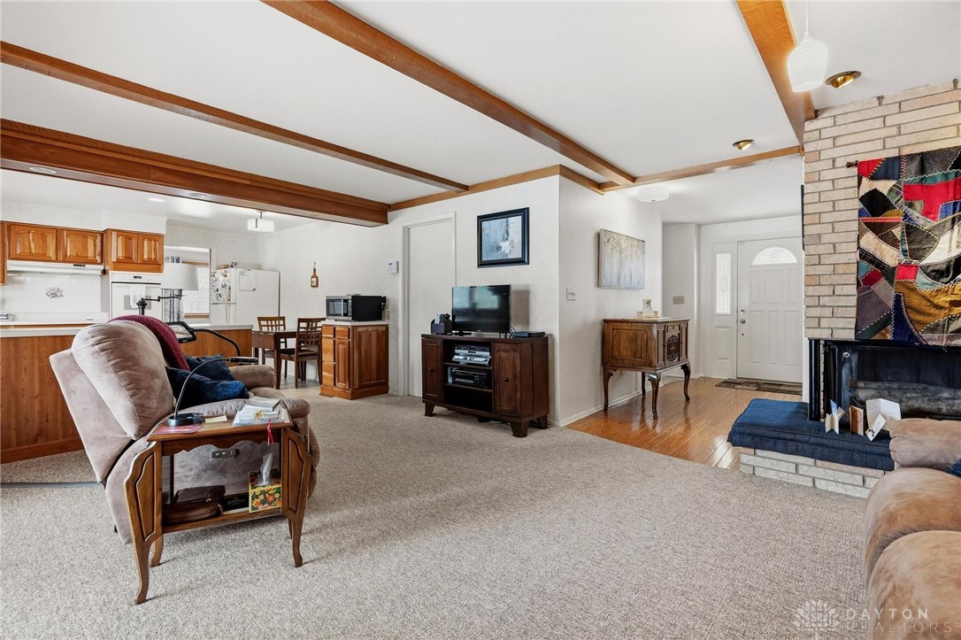 2409 East Rahn Road Dayton, OH 45440 - Photo 11 of 39 Family room with WB fireplace and entry way.