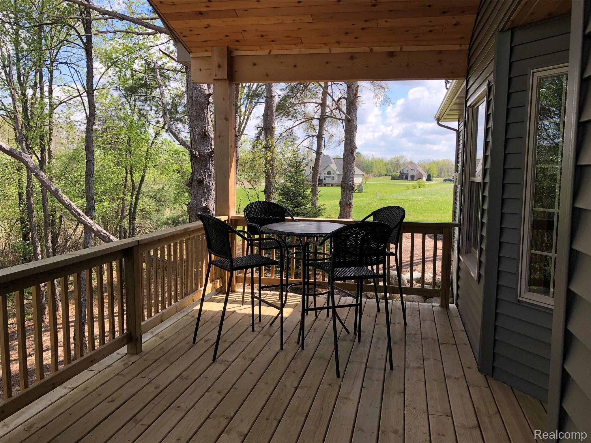 6263 General Squier Road Almont, MI 48003 - Photo 22 of 45 Deck off of dining room. Enjoy your morning coffee while listening to the birds or unwind in the evening with a glass of wine