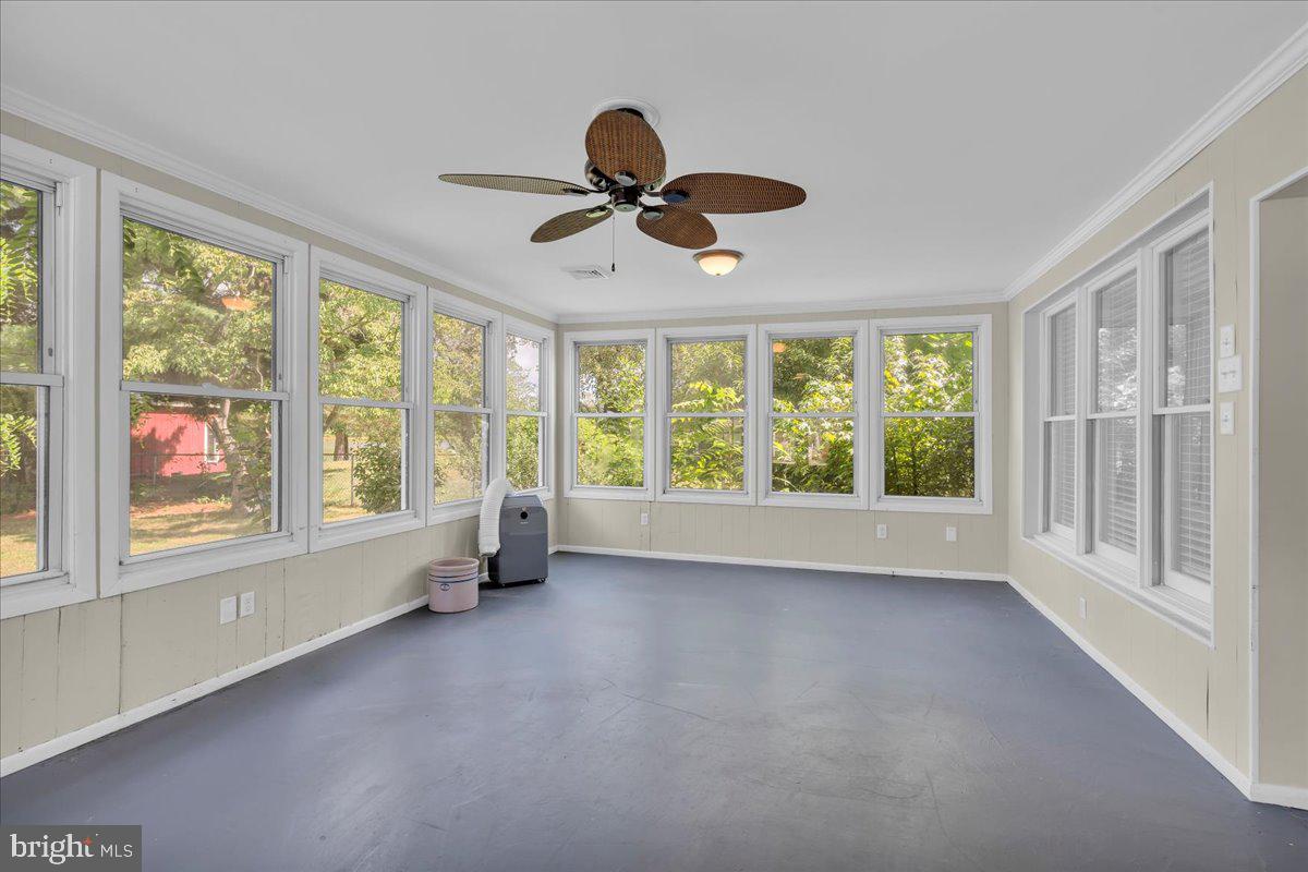 217 South Main Street Elmer, NJ 08318 - Photo 11 of 25 a view of an empty room with a window