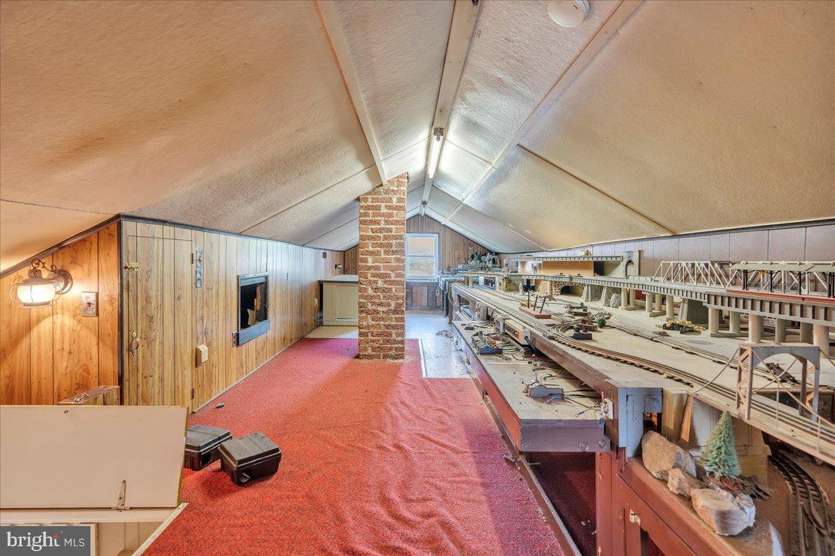 217 South Main Street Elmer, NJ 08318 - Photo 18 of 25 a storage & utility room with wooden floor