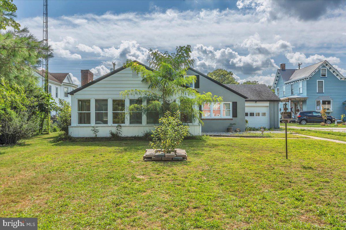217 South Main Street Elmer, NJ 08318 - Photo 20 of 25 a house view with swimming pool and yard