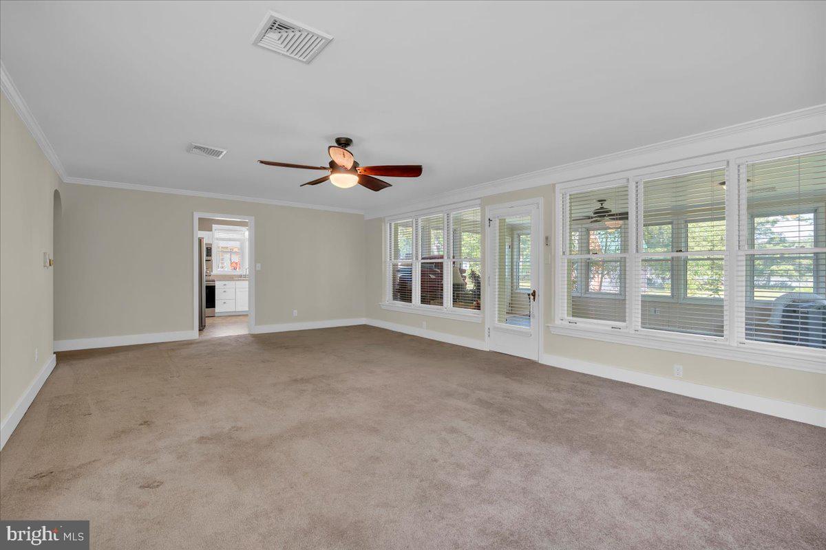 217 South Main Street Elmer, NJ 08318 - Photo 5 of 25 a view of an empty room with a window